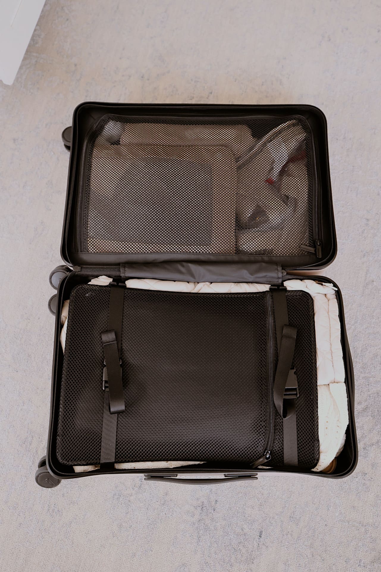 packing tips for traveling with a carry-on only with Quince Luggage