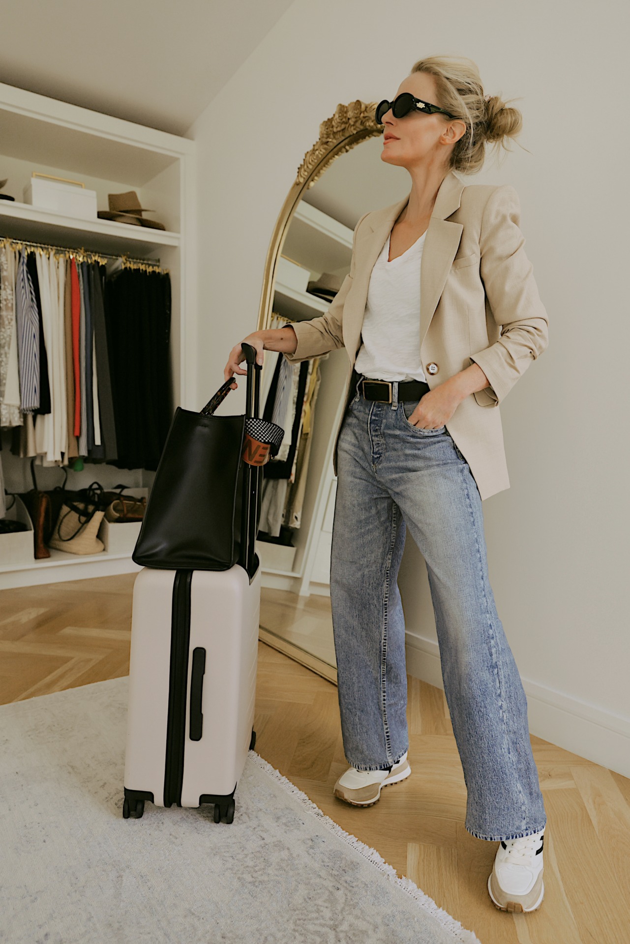 packing tips for traveling with a carry-on only, travel day outfit - wear layers