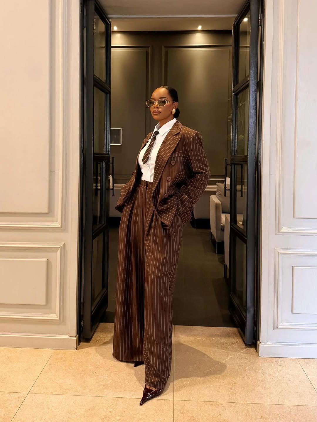 brown pinstripe suit