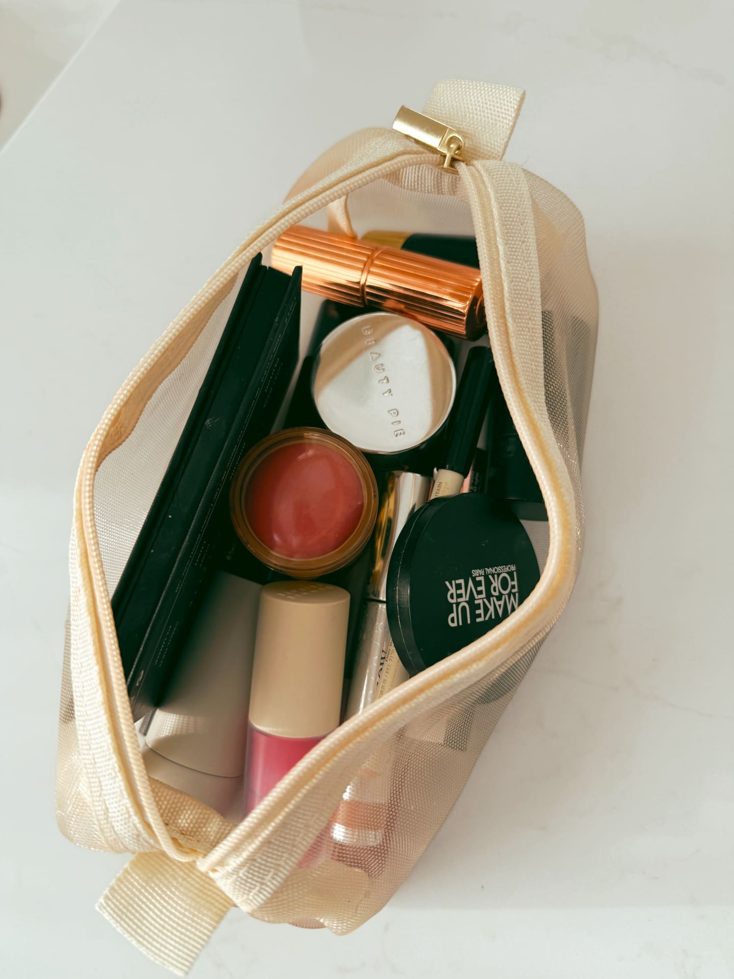 toiletries bag and packing tips for traveling with a carry-on only