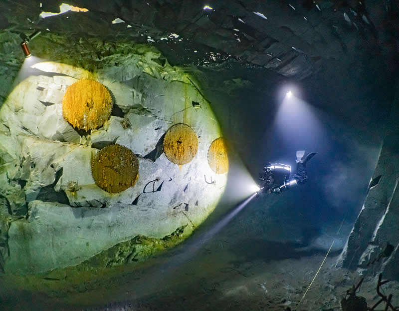 Portfolio - Silver: Orange, Black and Green: The Colors of Diving in Flooded Slate Mines by Frank Aron, Germany, Location: Nuttlar, Germany - 2025 DPG Masters Underwater Imaging Competition Winners