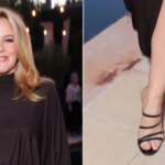 Alicia Silverstone wearing black strappy sandal mules at the 2026 WIF Oscars Nominee Celebration on Friday night.