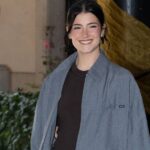 Charli D’Amelio’s Micro Shorts Play Peekaboo Under Coat for Fashion Week