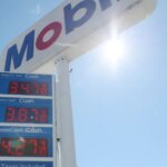 Gas prices are displayed at a Mobile Gas station on March 17, 2026