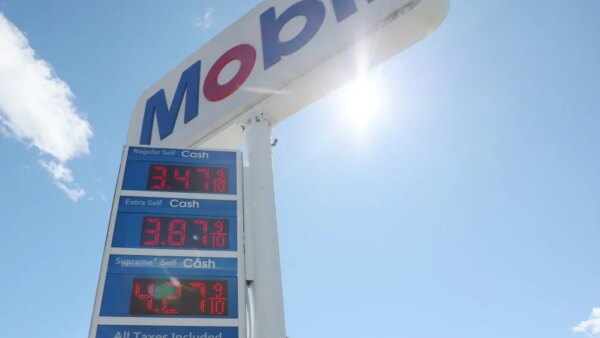 Gas prices are displayed at a Mobile Gas station on March 17, 2026