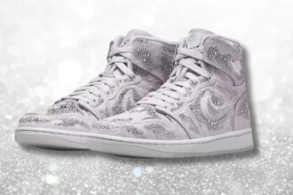 new nike x swarovski air jordan shoe with crystals overlaid on a sparkly white background