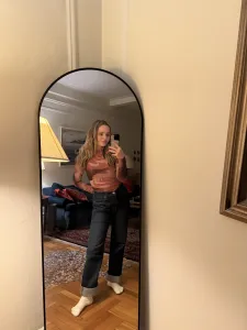 author trialing abercrombie's '90s-inspired relaxed fit straight-leg jeans with a mesh top; best straight-leg denim for women in 2026