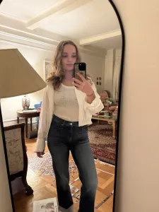 author modeling mother's straight-leg jean style the kick it in a medium blue, faded wash; best straight-leg jeans for women