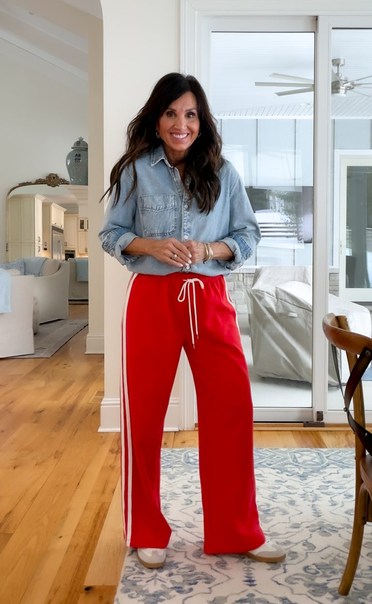 Cyndi Spivey wearing striped track pants.