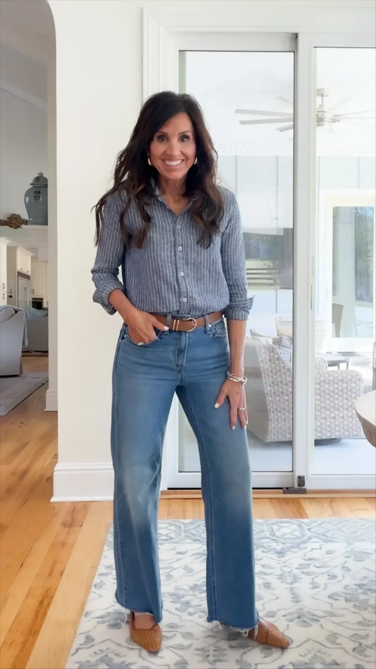 Cyndi Spivey styling a striped button up shirt for spring.