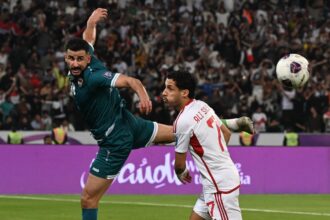 Iraq's Aymen Hussein heading the ball during the 2026 World Cup Qualification