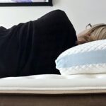 Pluto Pillow review, featuring our tester trying it out on her side and stomach
